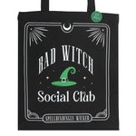 Black tote bag with 'Bad Witch Social Club' design featuring a green witch hat.