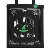 Black tote bag with 'Bad Witch Social Club' design featuring a green witch hat.