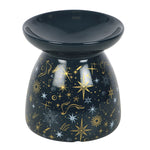Black ceramic oil burner with star and constellation design on a white background