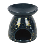 Black ceramic oil burner with star and moon designs on a white background