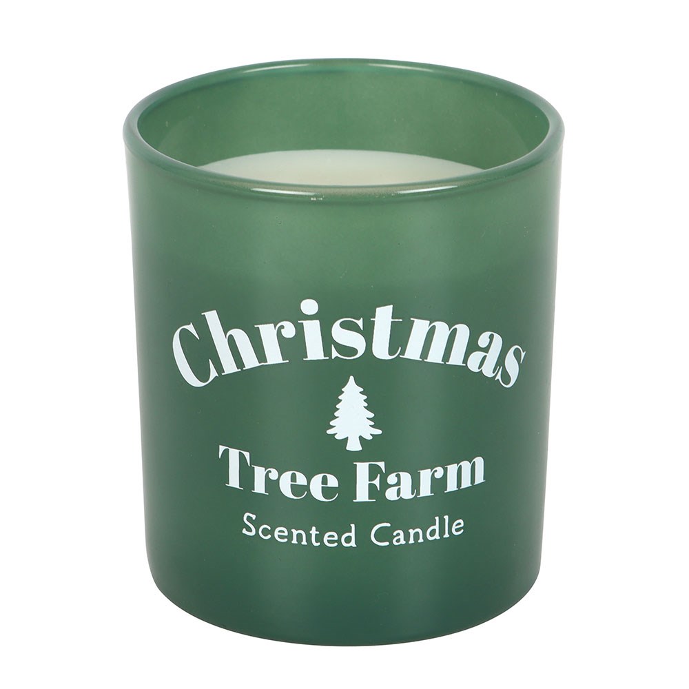 Green candle with 'Christmas Tree Farm Scented Candle' text and tree graphic on a white background