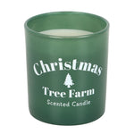 Green candle with 'Christmas Tree Farm Scented Candle' text and tree graphic on a white background