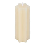 Hexagonal white candle on a white background