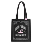 Black tote bag with 'Good Witch Social Club' design on a white background