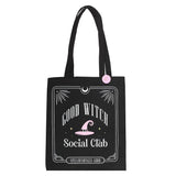 Black tote bag with 'Good Witch Social Club' design on a white background