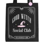 Black tote bag with 'Good Witch Social Club' text and pink witch hat design on a white background