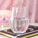 Clear glass with text 'Good Witch, Bad Witch, Pure Evil' on a pink background