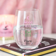 Clear glass with text 'Good Witch, Bad Witch, Pure Evil' on a pink background
