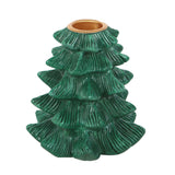 Green ceramic tree-shaped candle holder on a white background