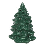 Green ceramic Christmas tree ornament on a white background