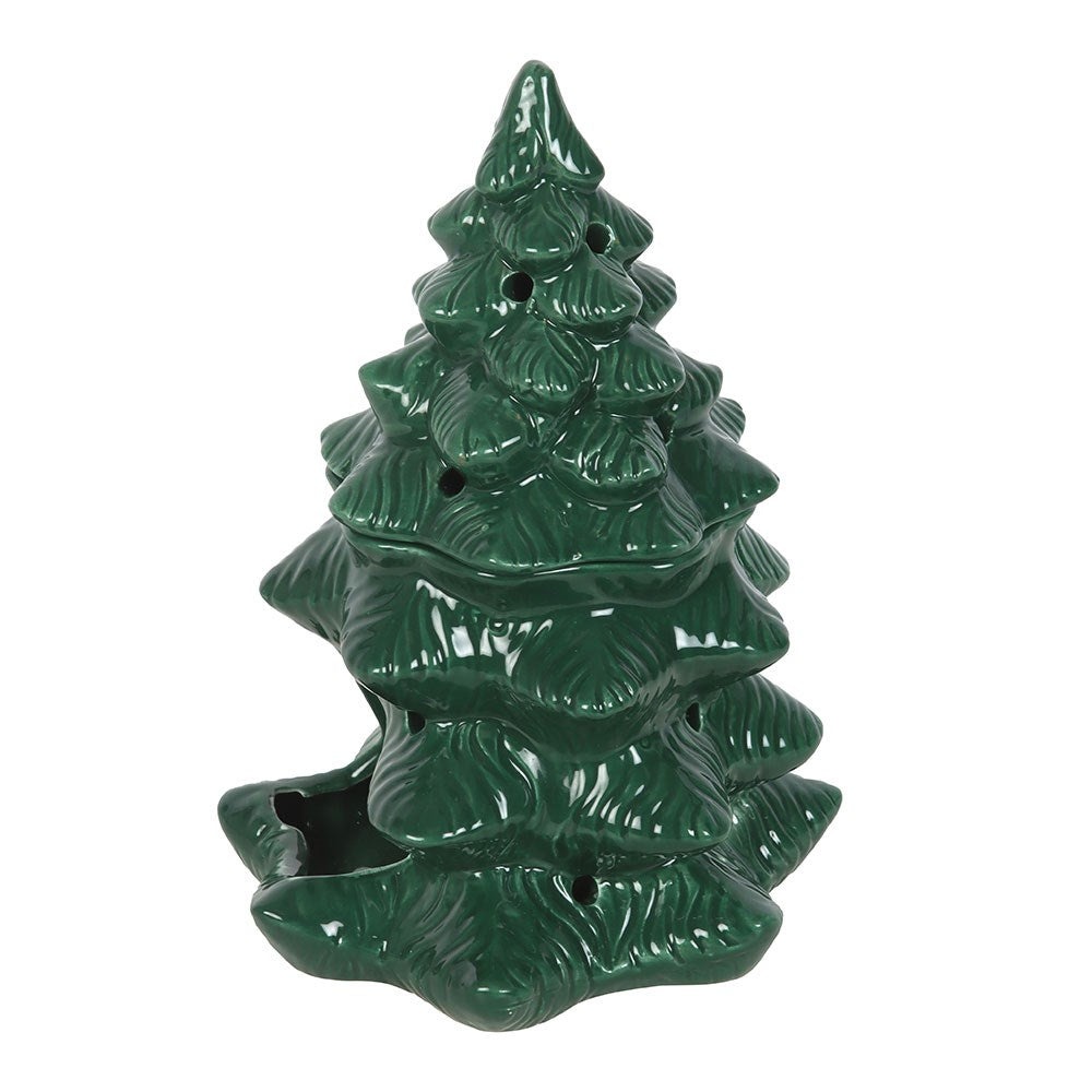 Green ceramic Christmas tree-shaped candle on a white background