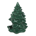 Green ceramic Christmas tree-shaped candle on a white background