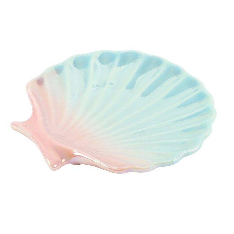 Shell-shaped dish with pastel gradient design on a white background