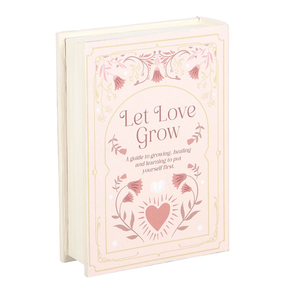 Book titled 'Let Love Grow' with decorative cover on a white background