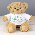 A beige teddy bear with a white jumper that says 'best daddy' with a personalised message 'From Sophie x'.