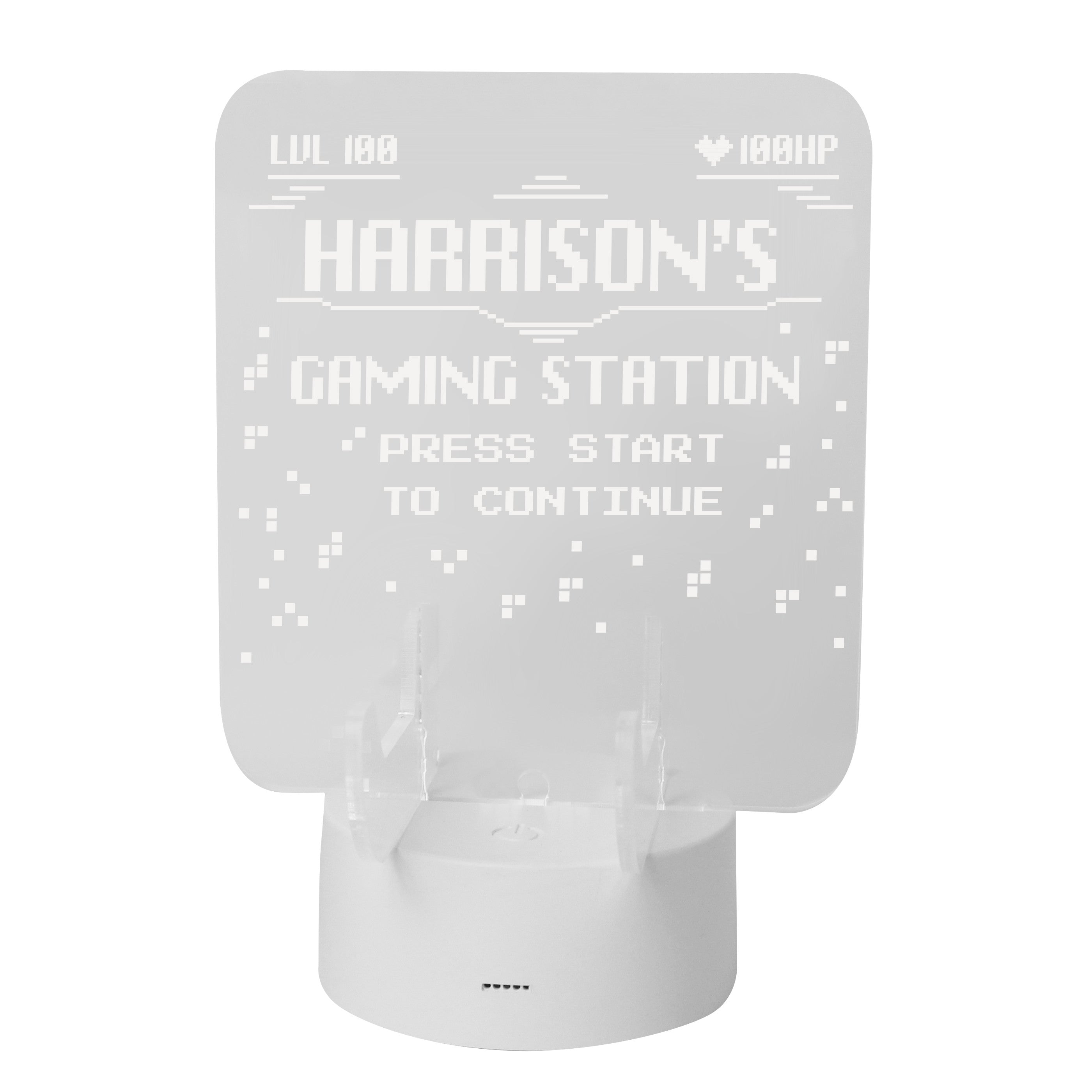 Personalised gaming controller holder with LED colour changing light, displaying a name and gaming-related phrases on a illuminated panel.
