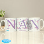 Three ceramic mugs with 'Nan' written on each, featuring floral and animal designs, placed on a table with a 'Me To You' logo in the corner.