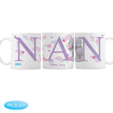 Three ceramic mugs with 'Nan' written on each, featuring floral and animal designs, placed on a table with a 'Me To You' logo in the corner.