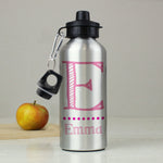 A silver aluminum drinks bottle with a black lid and a strap, personalized with the name 'Sarah' in pink.