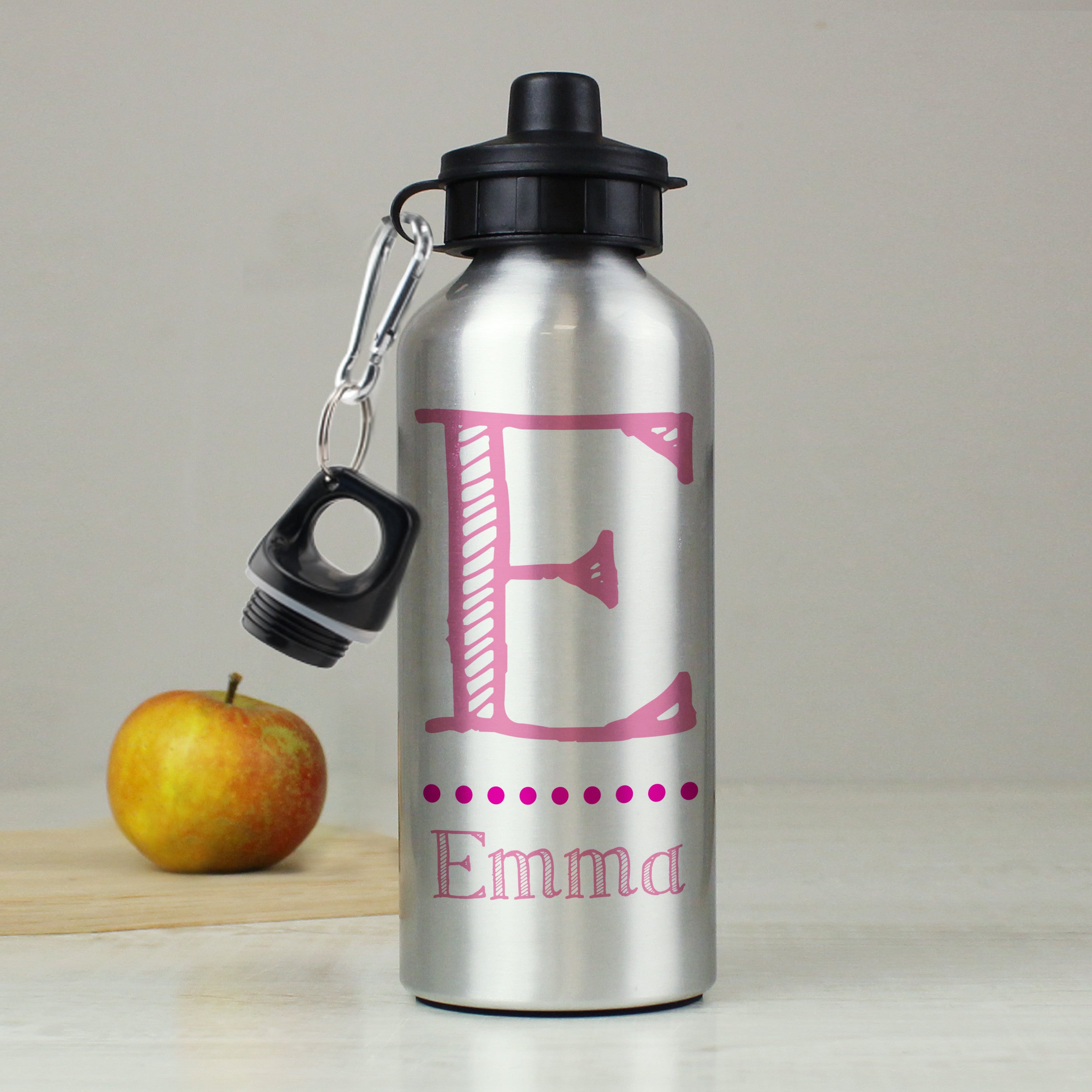 A silver aluminum drinks bottle with a black lid and a strap, personalized with the name 'Sarah' in pink.