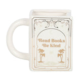 White mug with 'Read Books Be Kind' text and palm tree design on a white background