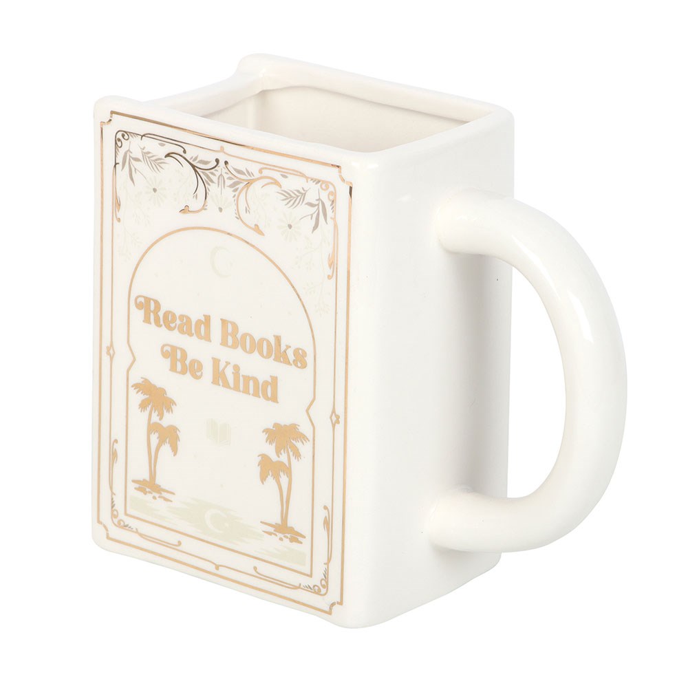 White mug with book design and text 'Read Books Be Kind' on a white background