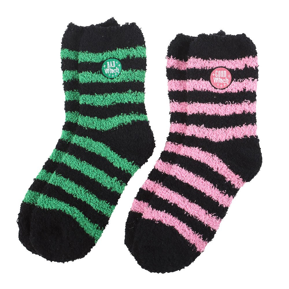 Two pairs of striped socks with fuzzy texture on a white background