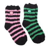 Two pairs of striped socks, one pink and black, the other green and black, on a white background.