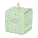 Mint green box with 'The Enchanted Library' branding and swan design on a white background