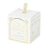 Scented candle packaging with 'The Story of Serenity' branding on a white background