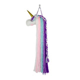 A multicolored unicorn wall hanging decoration with a gold horn and purple, pink, and blue tassels.