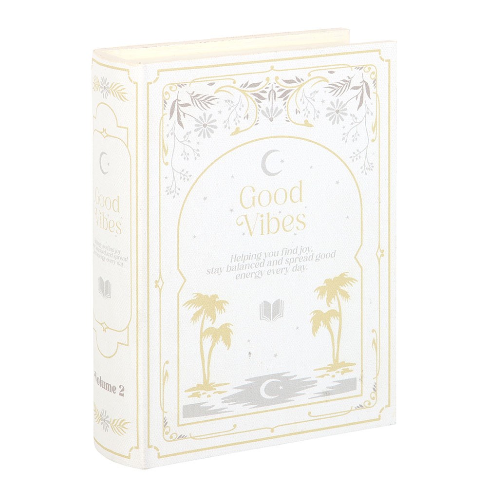 Packaging of 'Good Vibes' book with decorative elements on a white background