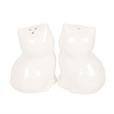 Two white ceramic cat-shaped salt and pepper shakers on a white background