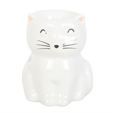 White ceramic cat-shaped night light on a white background