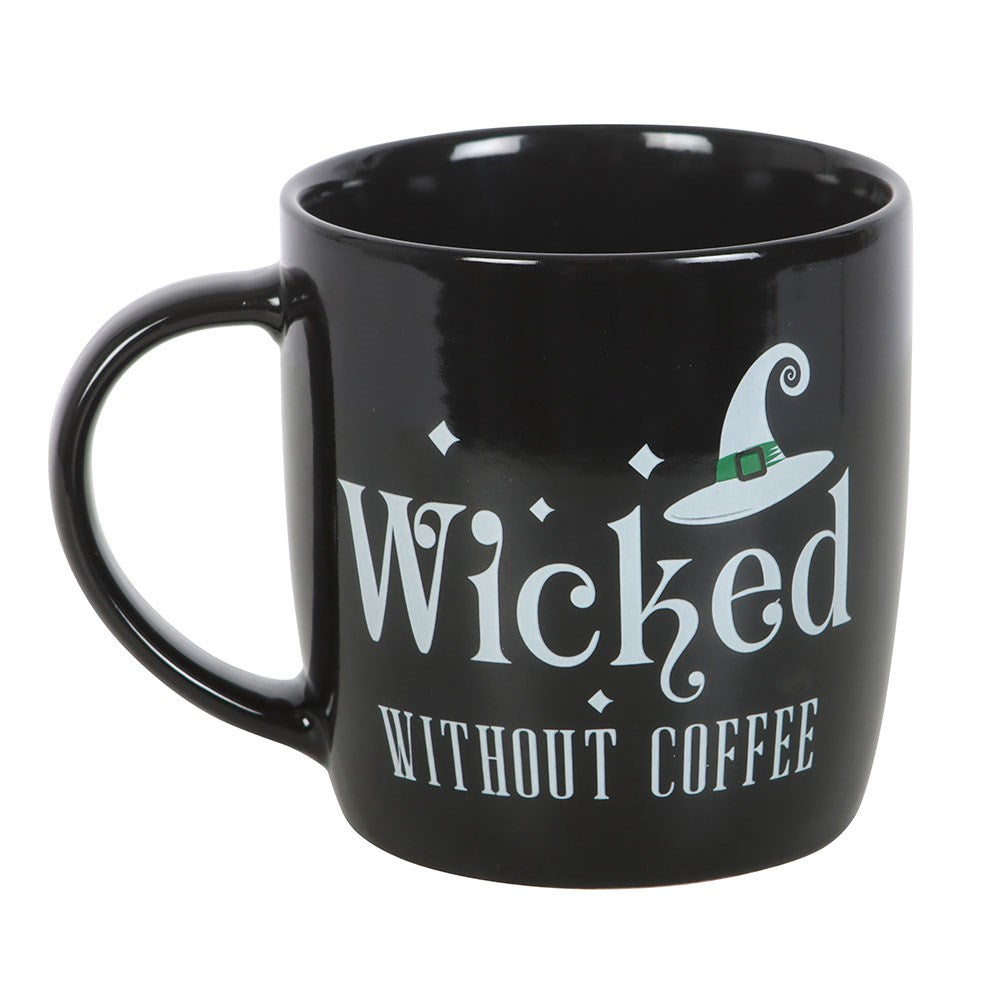 Black mug with 'Wicked Without Coffee' text and witch hat design on a white background