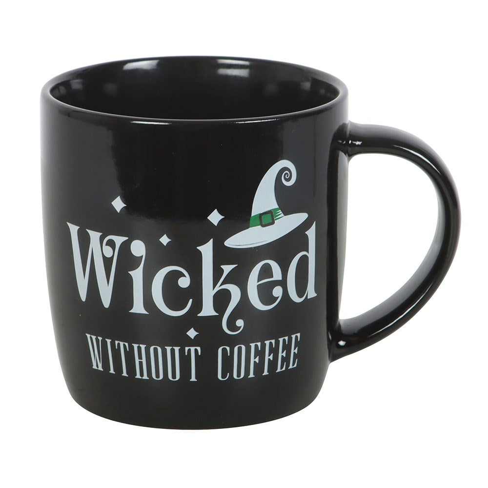 Black mug with 'Wicked Without Coffee' text and witch hat design on a white background